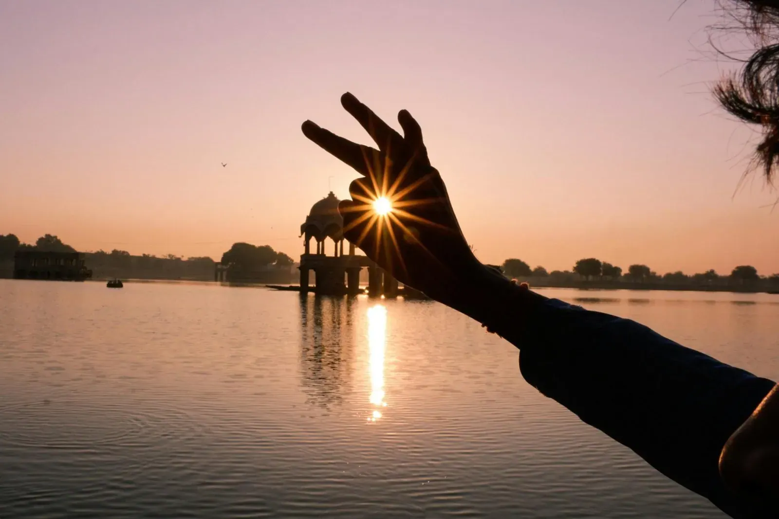 Sunset over the chhatris of Gadisar Lake in Jaisalmer